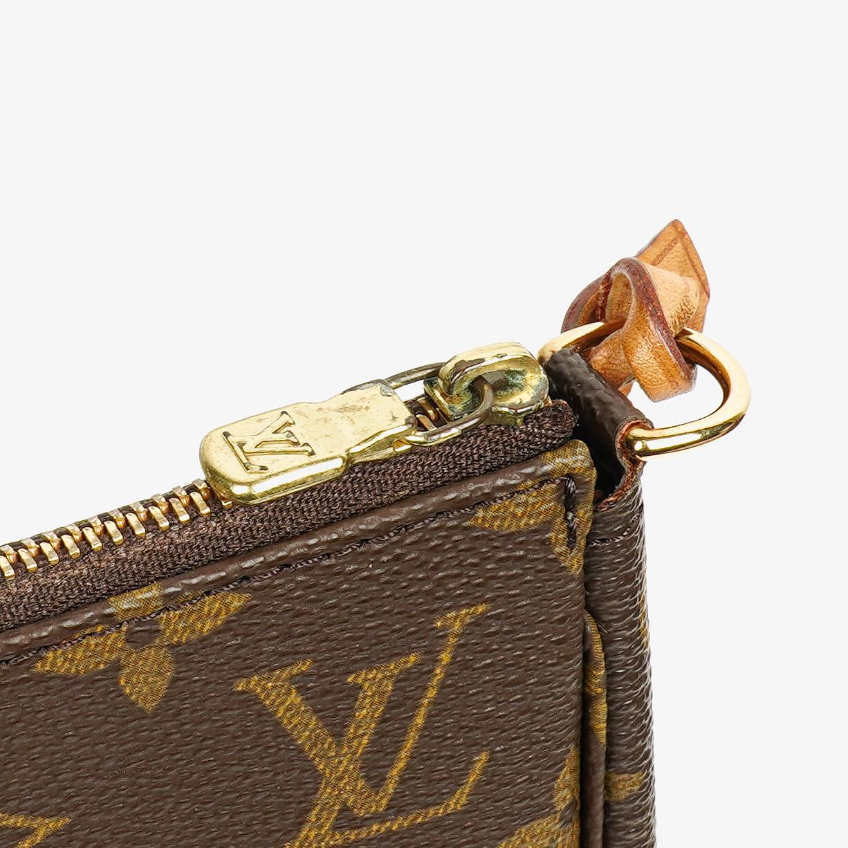 Louis Vuitton Pochette Accessoires Clutch aus Monogram Canvas
