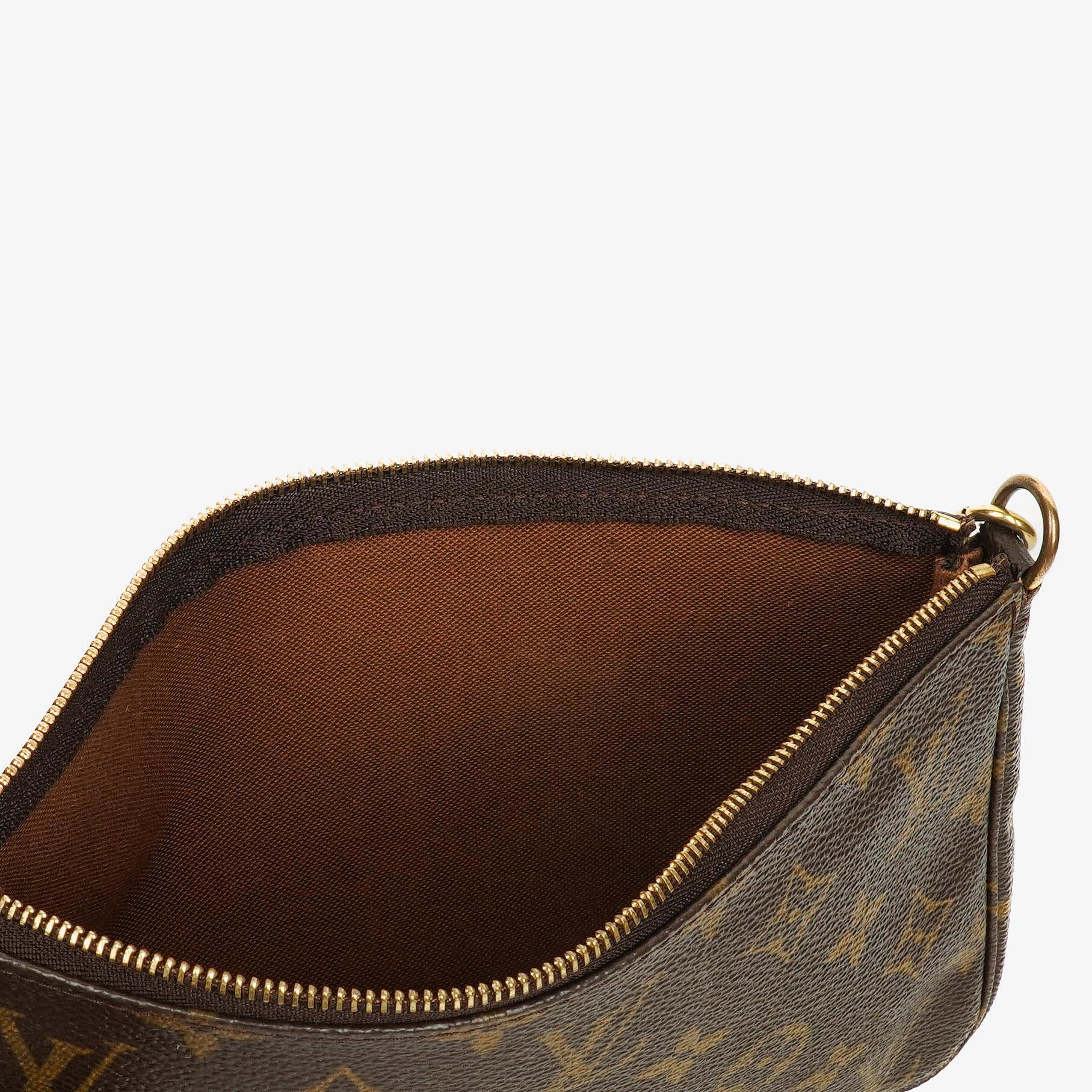 Louis Vuitton Pochette Accessoires Clutch aus Monogram Canvas