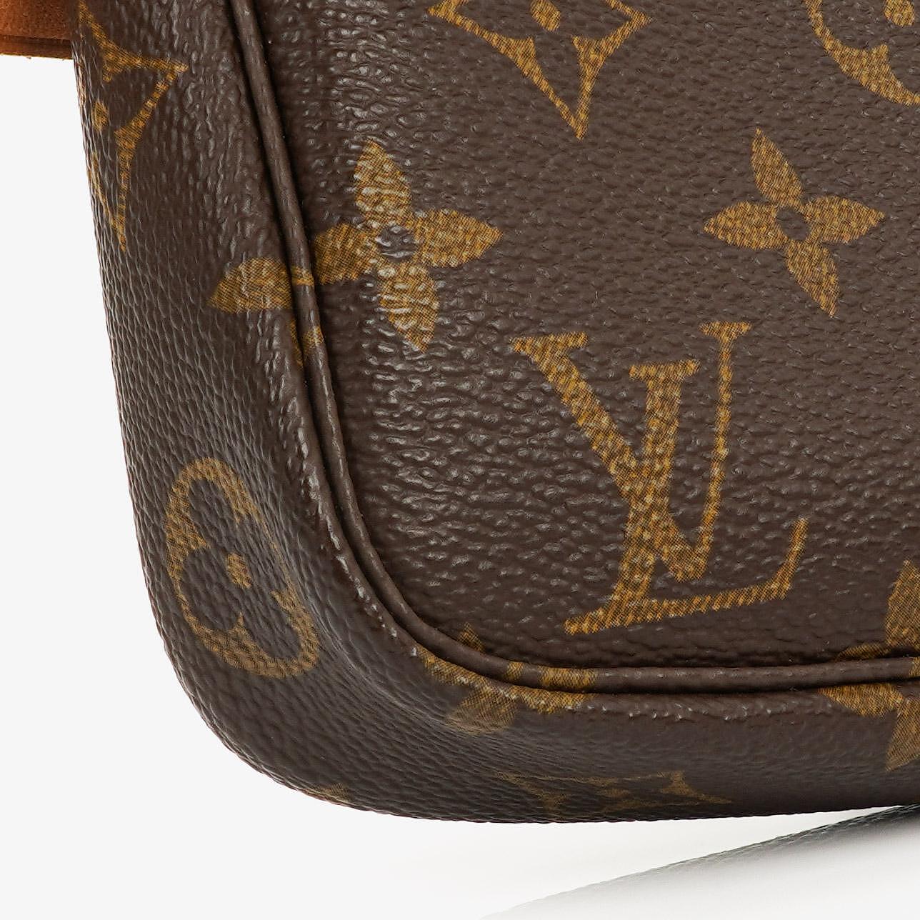 Louis Vuitton Pochette Accessoires Monogram Canvas Clutch Tasche