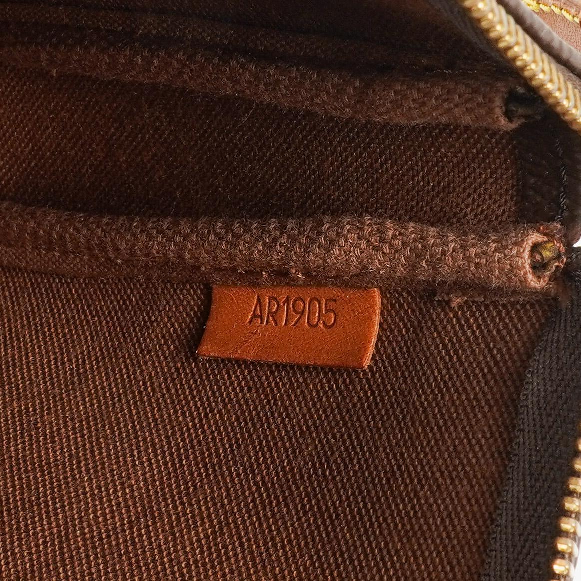 Louis Vuitton Pochette Accessoires Monogram Canvas Clutch Tasche