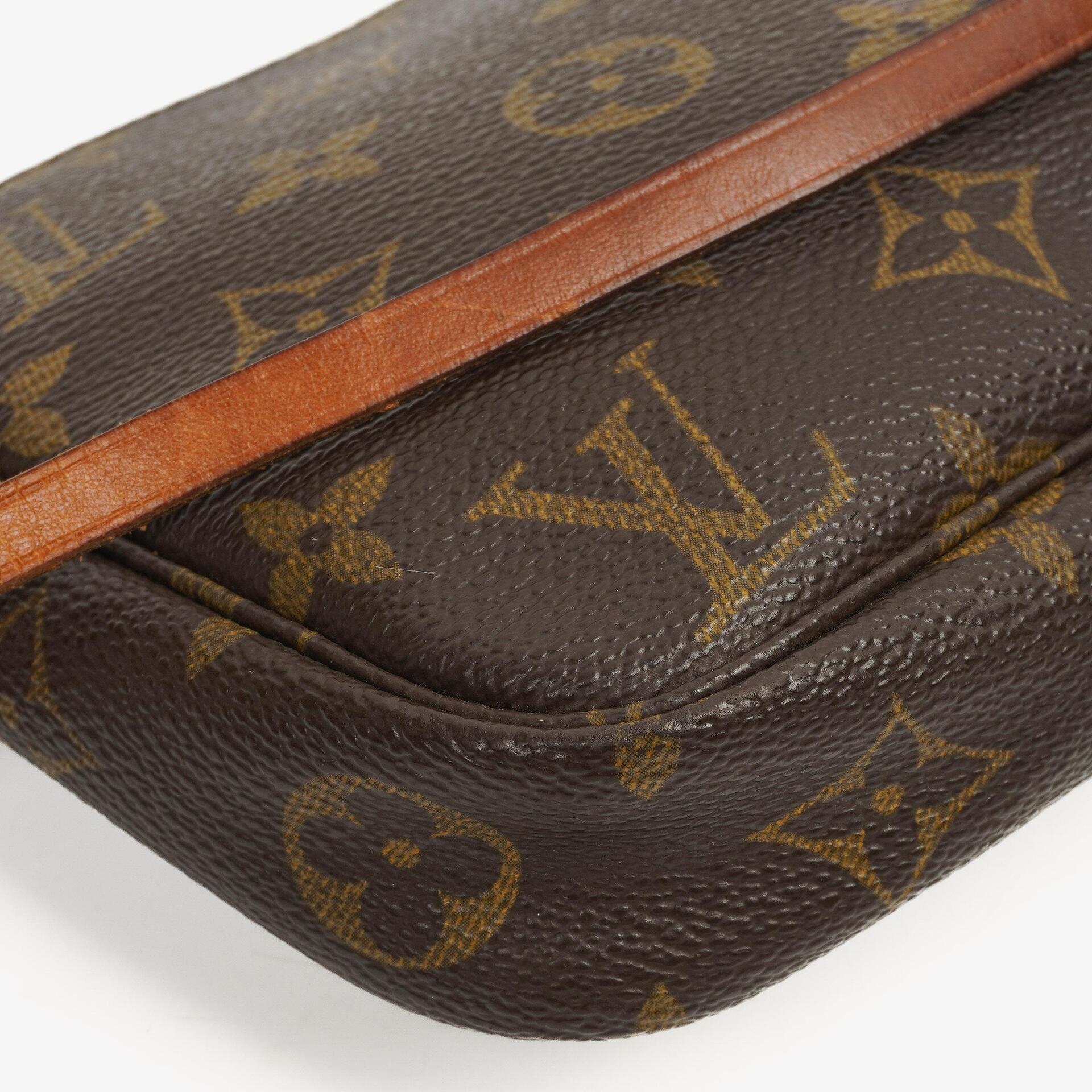 Louis Vuitton Pochette Accessoires Monogram Canvas Clutch Handtasche