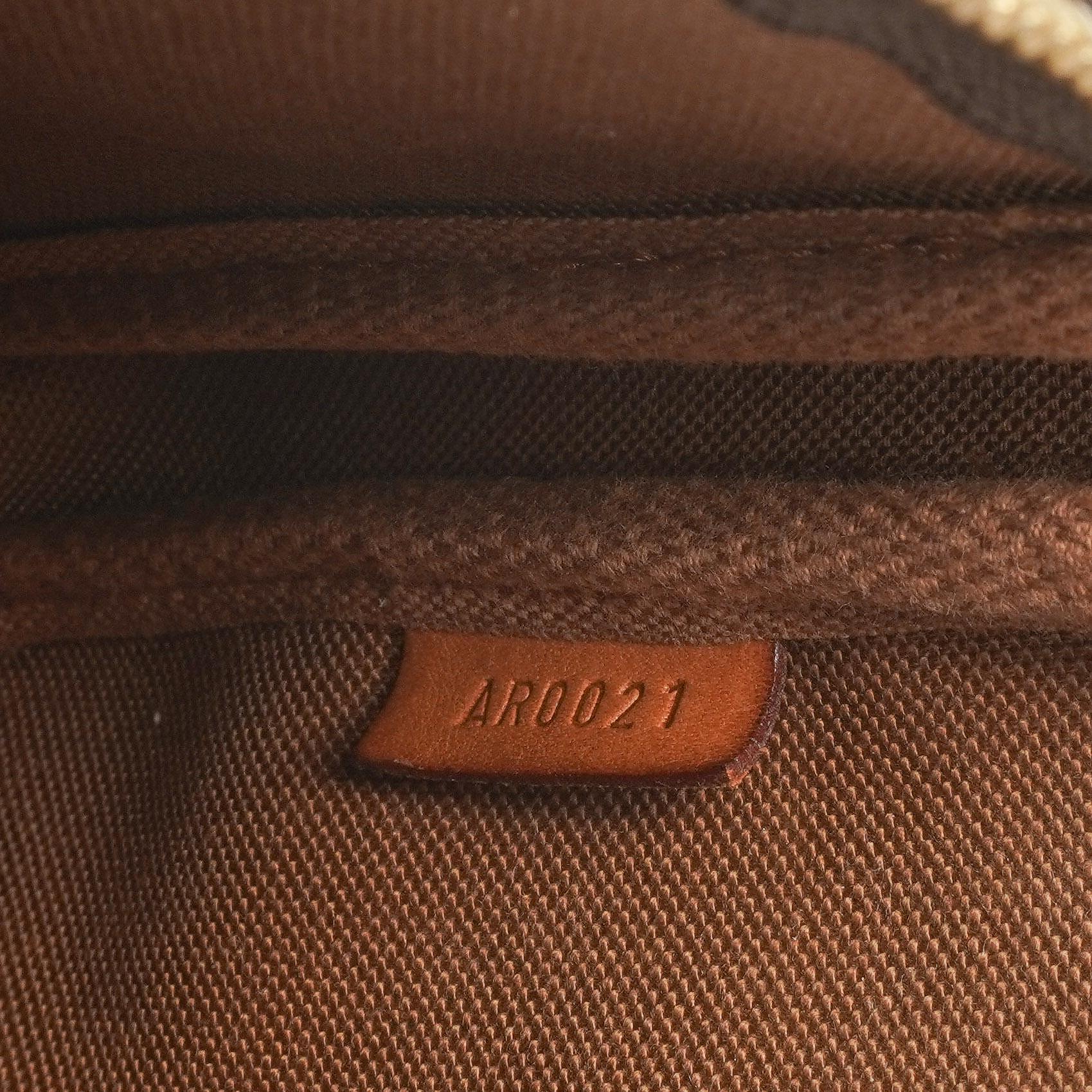 Louis Vuitton Pochette Accessoires Monogram Canvas Clutch Handtasche