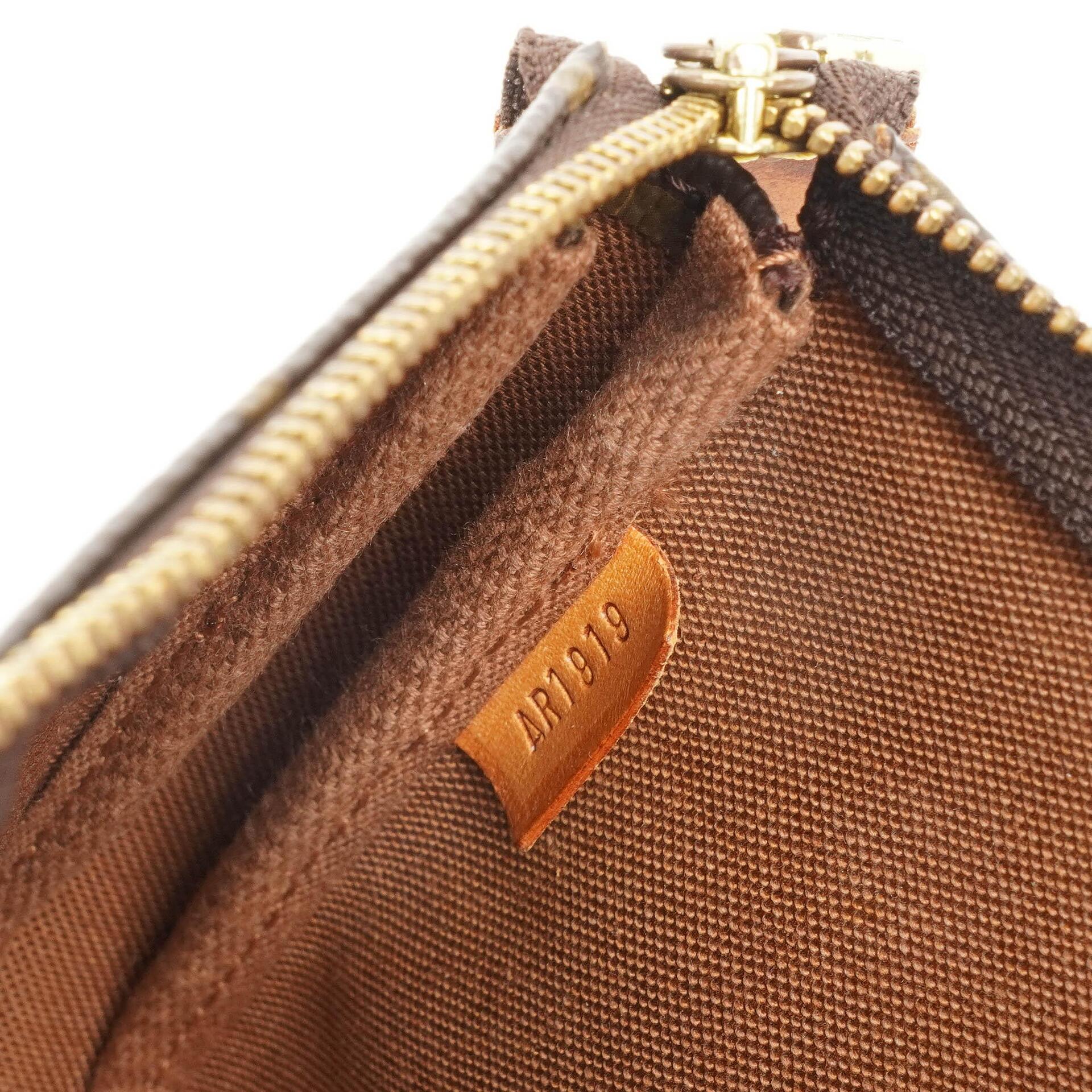 Louis Vuitton Pochette Accessoires Clutch Handtasche Monogram Canvas