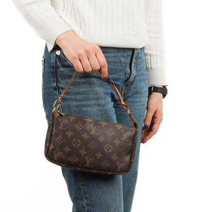 Louis Vuitton Pochette Accessoires Clutch-Handtasche aus Monogram Canvas