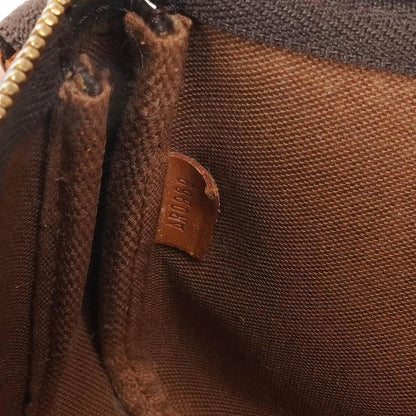 Louis Vuitton Pochette Accessoires Clutch-Handtasche aus Monogram Canvas