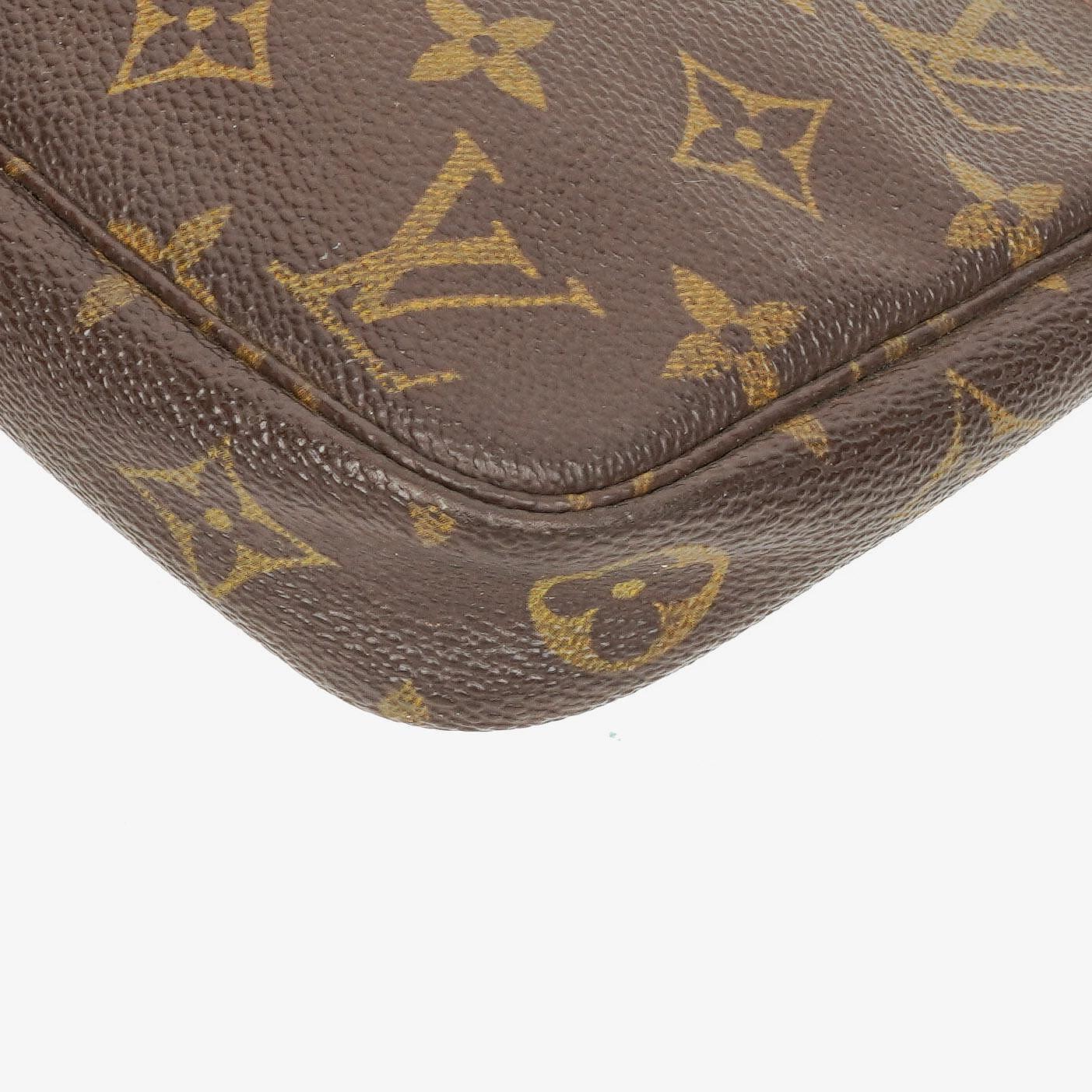 Louis Vuitton Pochette Accessoires Clutch-Handtasche aus Monogram Canvas