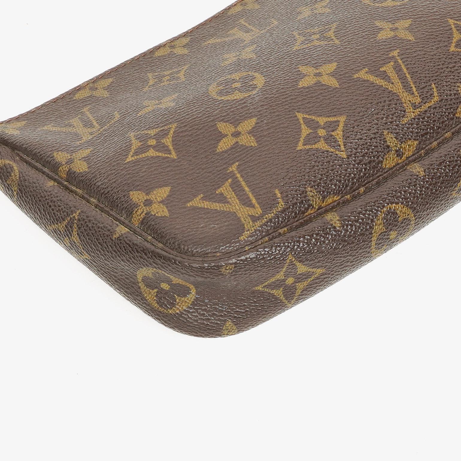 Louis Vuitton Pochette Accessoires Clutch-Handtasche aus Monogram Canvas