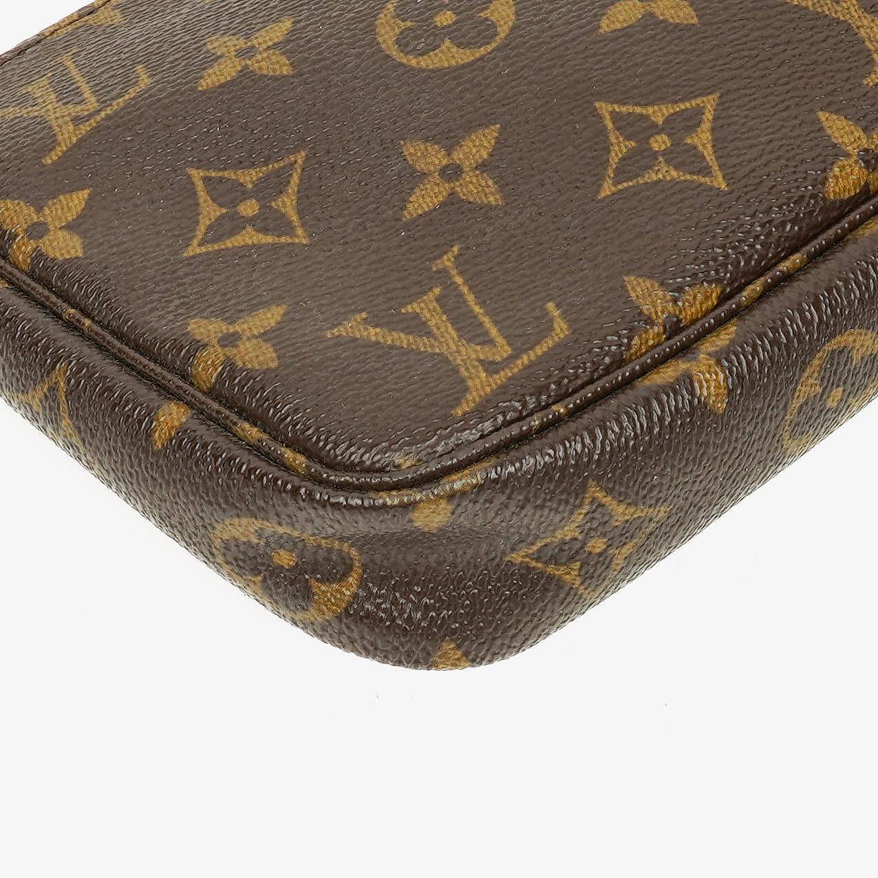 Louis Vuitton Pochette Accessoires Clutch Handtasche aus Monogram Canvas