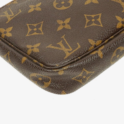 Louis Vuitton Pochette Accessoires Clutch Handtasche aus Monogram Canvas