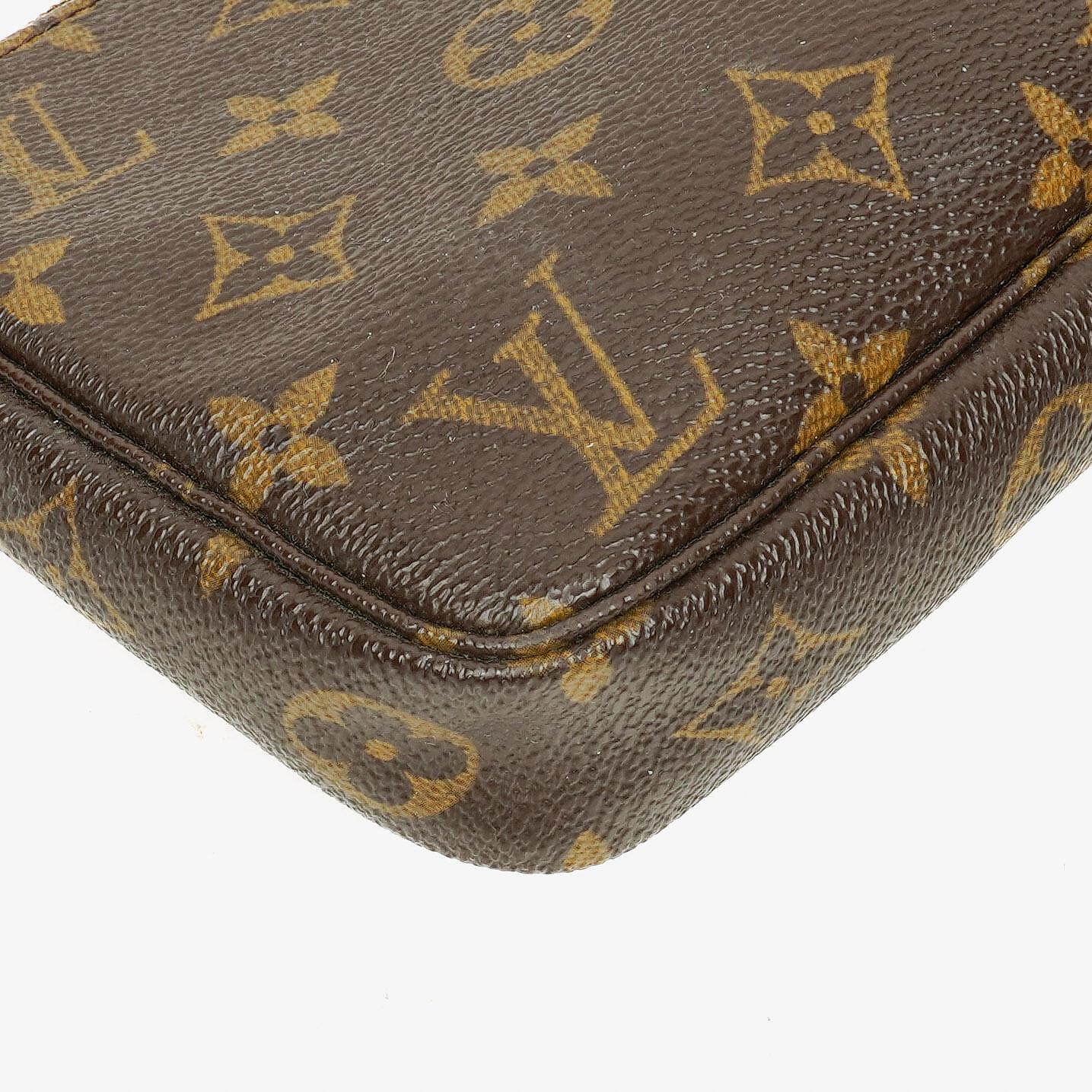 Louis Vuitton Pochette Accessoires Clutch Handtasche aus Monogram Canvas