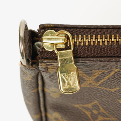 Louis Vuitton Pochette Accessoires Clutch-Handtasche aus Monogram Canvas