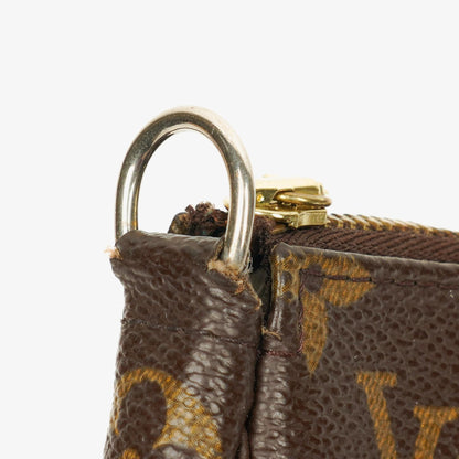 Louis Vuitton Pochette Accessoires Clutch-Handtasche aus Monogram Canvas