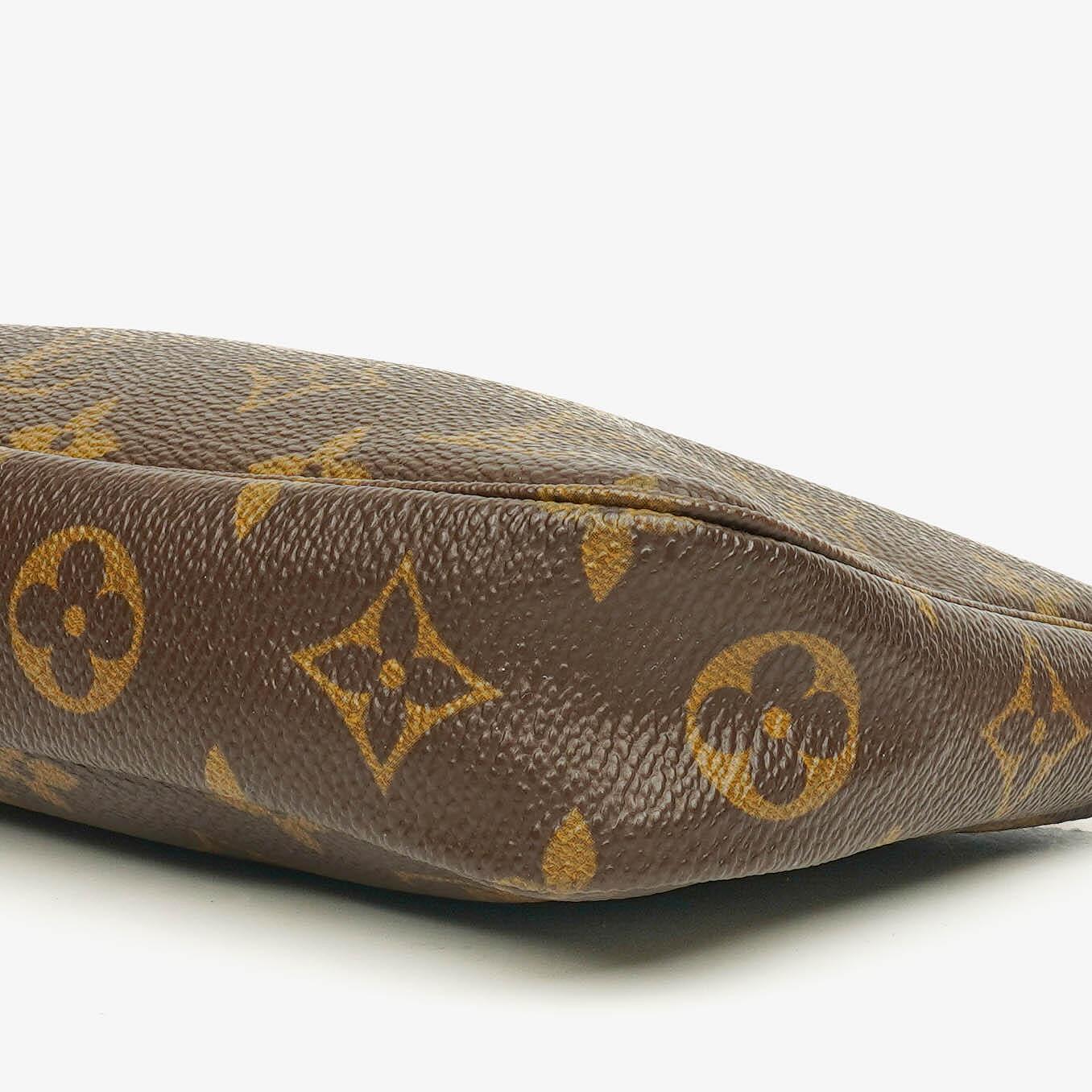 Louis Vuitton Pochette Accessoires Clutch-Handtasche aus Monogram Canvas