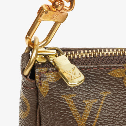 Louis Vuitton Pochette Accessoires Clutch-Handtasche aus Monogram Canvas