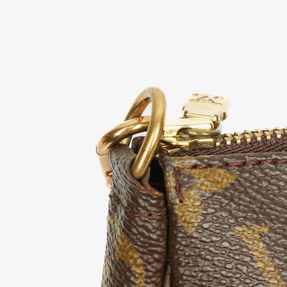 Louis Vuitton Pochette Accessoires Clutch-Handtasche aus Monogram Canvas