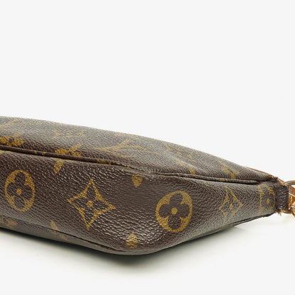 Louis Vuitton Pochette Accessoires Clutch-Handtasche aus Monogram Canvas