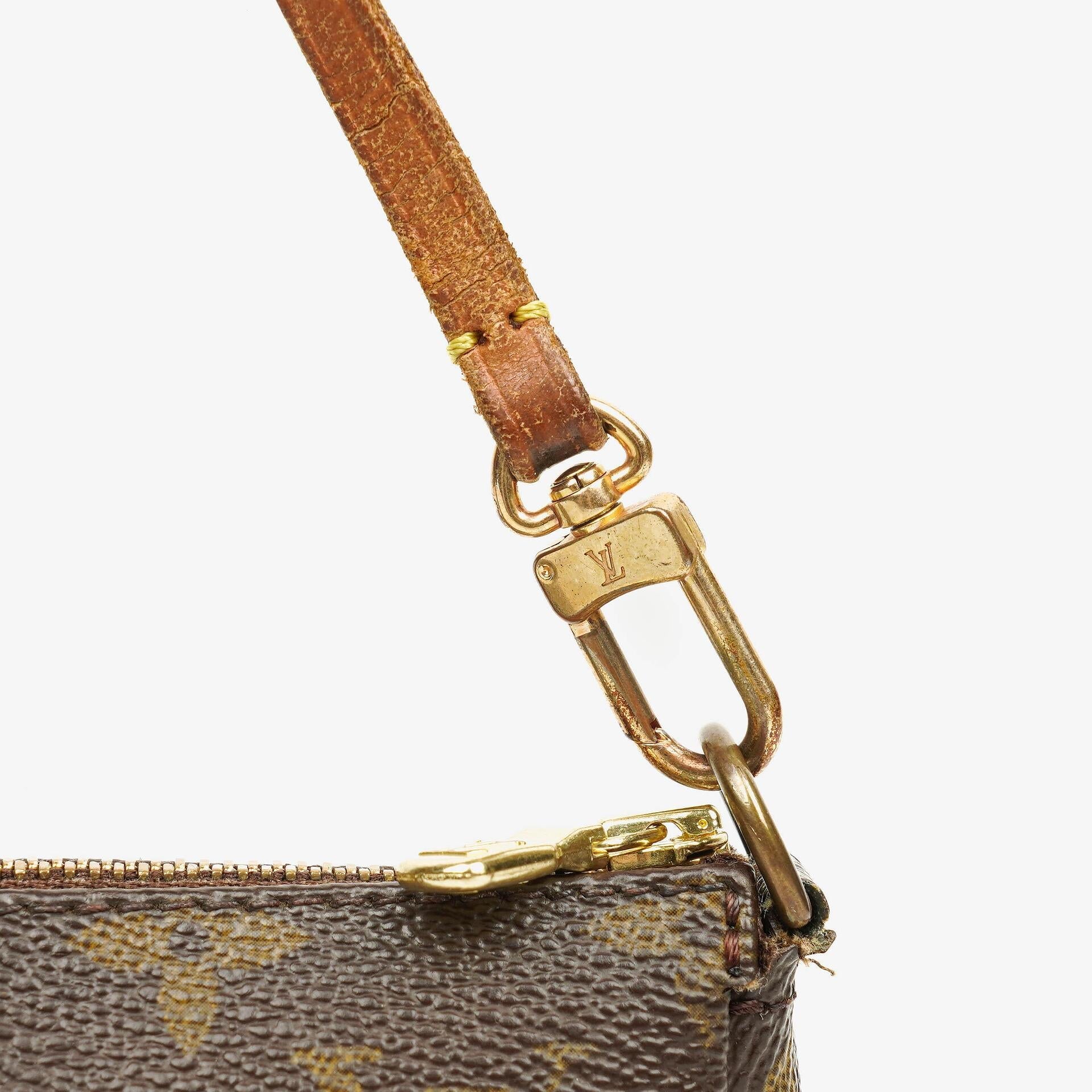 Louis Vuitton Pochette Accessoires Clutch-Handtasche aus Monogram Canvas