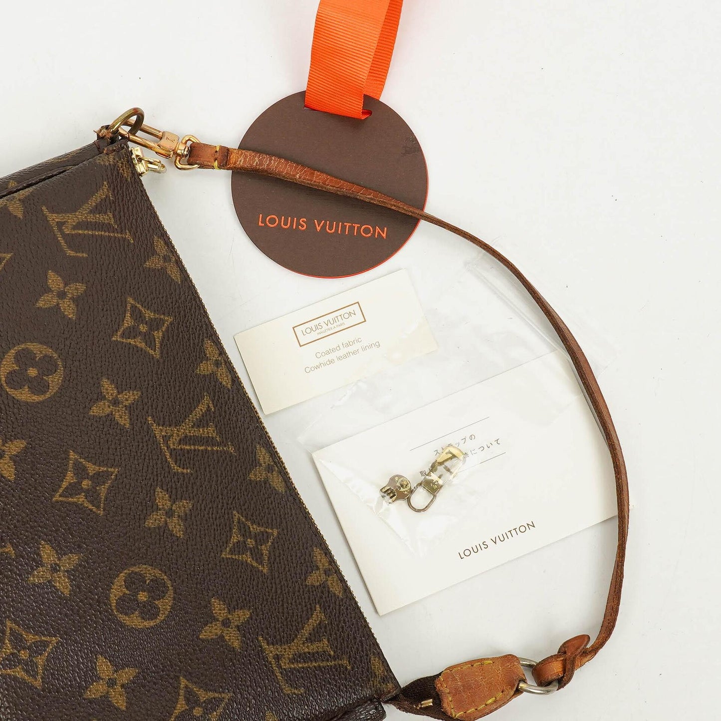 Louis Vuitton Pochette Accessoires Clutch-Handtasche aus Monogram Canvas