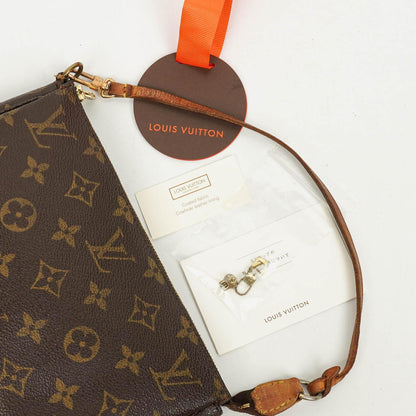 Louis Vuitton Pochette Accessoires Clutch-Handtasche aus Monogram Canvas