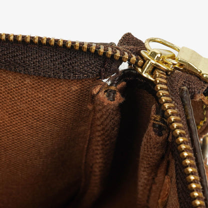 Louis Vuitton Pochette Accessoires Clutch-Handtasche aus Monogram Canvas
