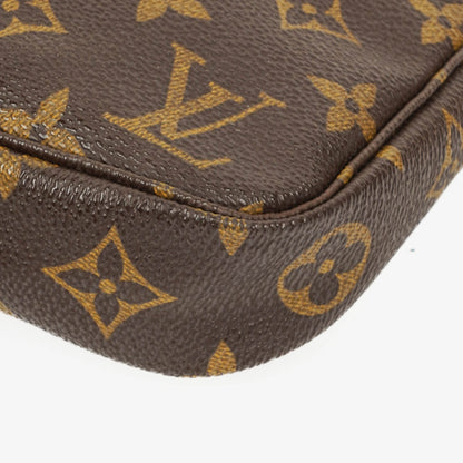 Louis Vuitton Pochette Accessoires Clutch-Handtasche aus Monogram Canvas