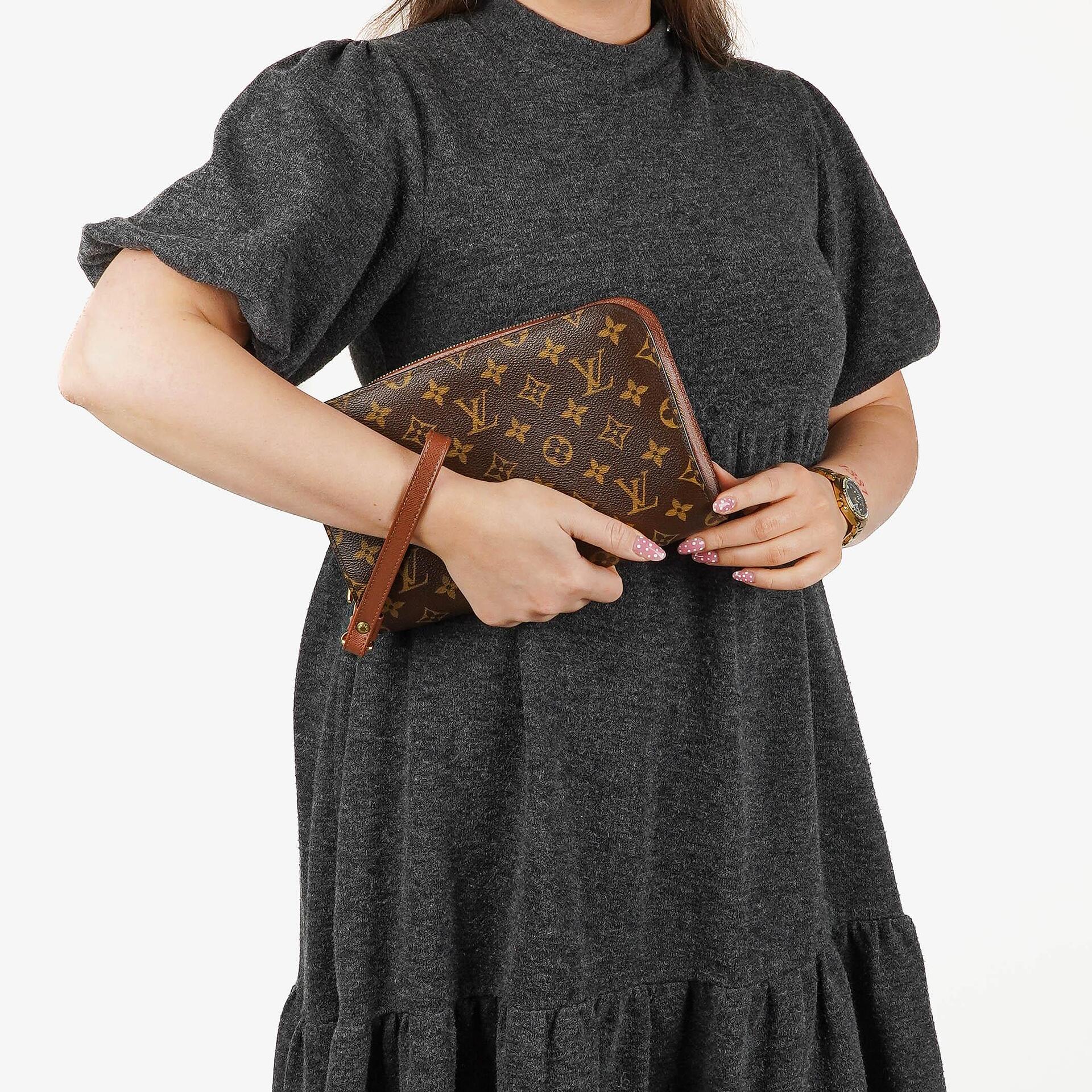 Louis Vuitton Pochette Orsay Monogram Clutch