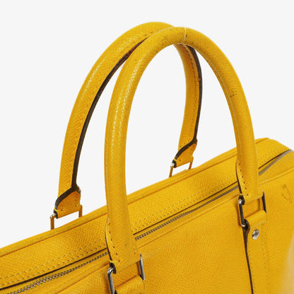 Louis Vuitton Porte Documents Voyage Aktentasche aus gelbem Altair Taiga-Leder