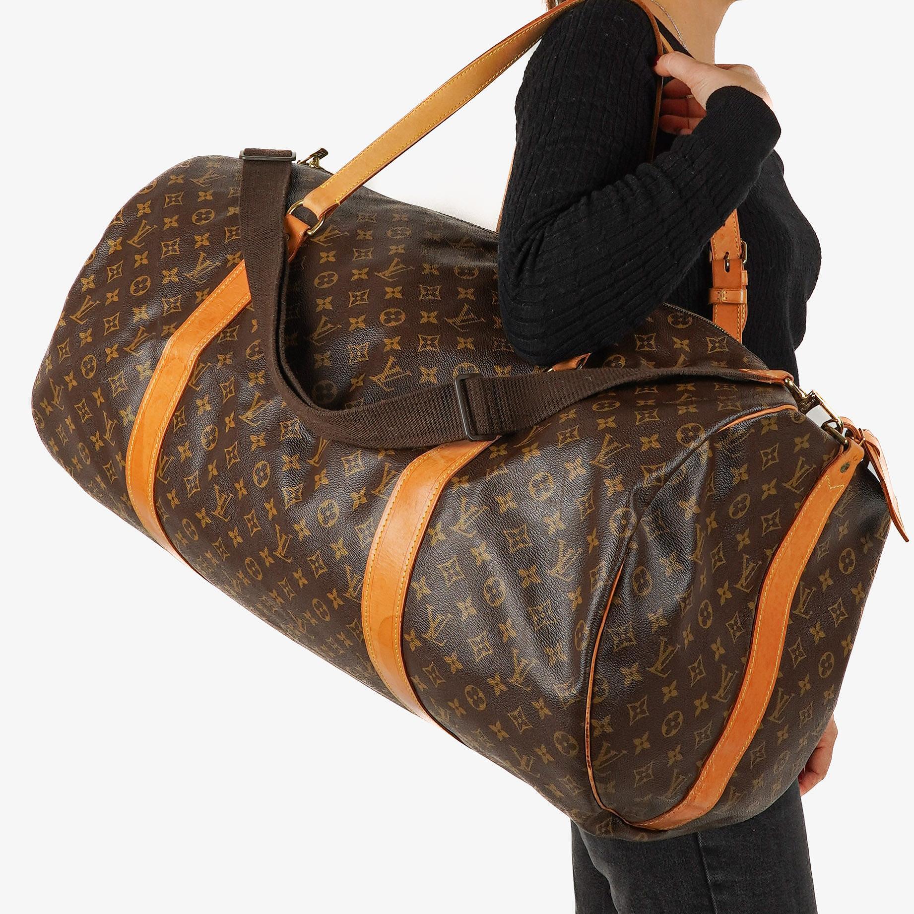 Louis Vuitton Sac Polochon 65 Reisetasche aus Monogram Canvas