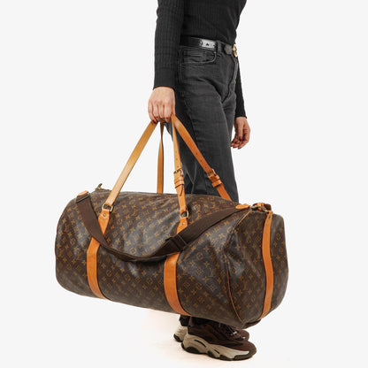 Louis Vuitton Sac Polochon 65 Reisetasche aus Monogram Canvas