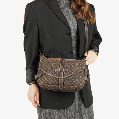 Louis Vuitton Saumur 30 Mini Lin Monogramm in Dune