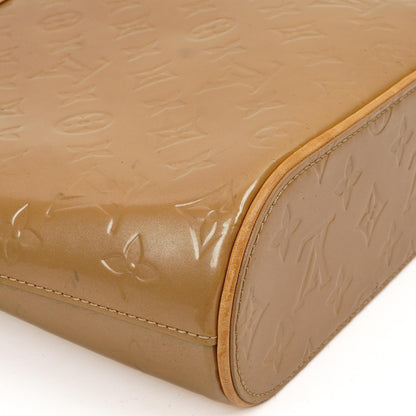 Louis Vuitton Stillwood Vertikale Beigefarbene Monogram Vernis Handtasche