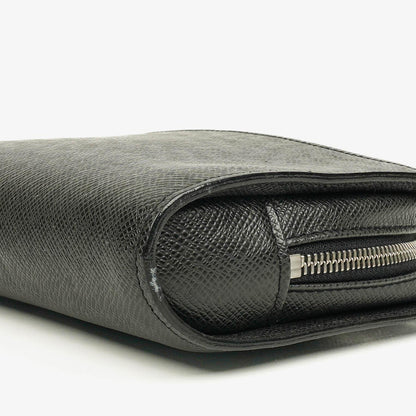 Louis Vuitton Orsay Clutch aus Taiga Leder