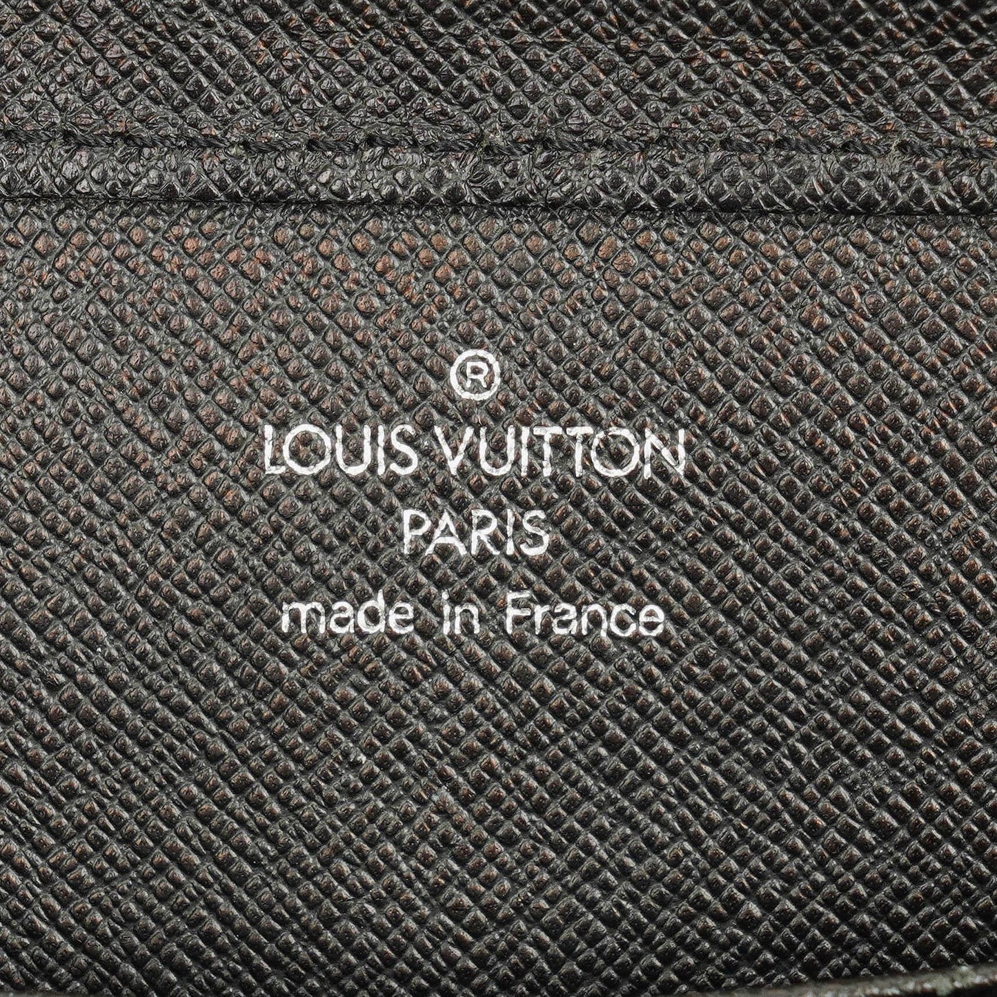 Louis Vuitton Orsay Clutch aus Taiga Leder