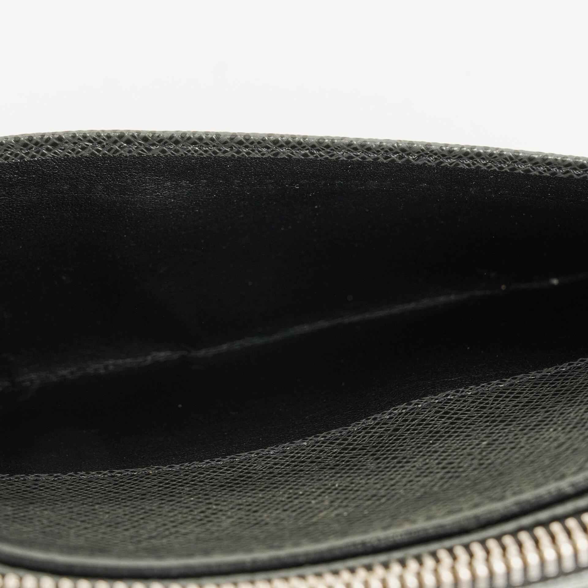 Louis Vuitton Orsay Clutch aus Taiga Leder