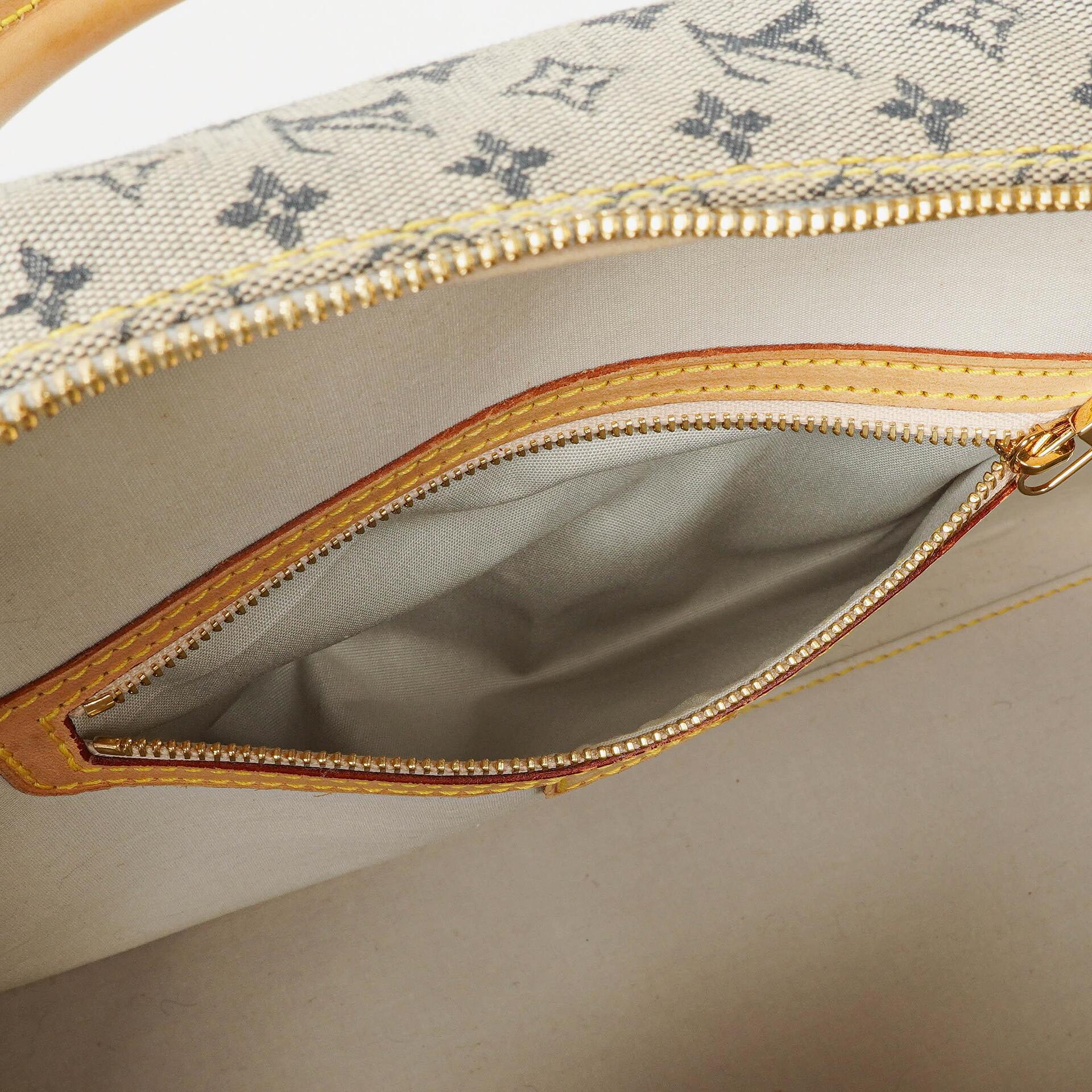 Louis Vuitton Tompkins Monogram Mini Lin Tasche