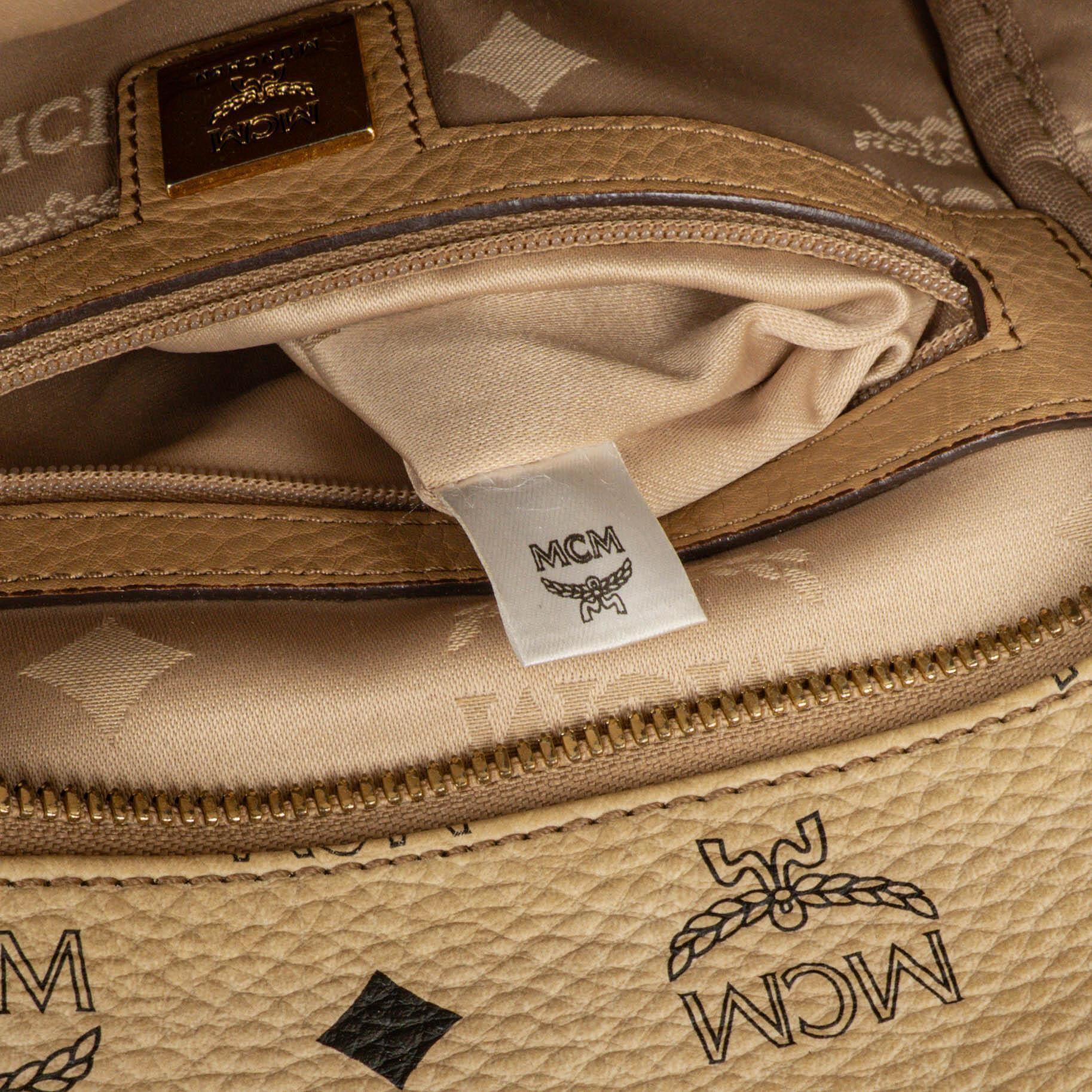 MCM Visetos Rucksack aus neutralem beschichtetem Canvas mit Nieten
