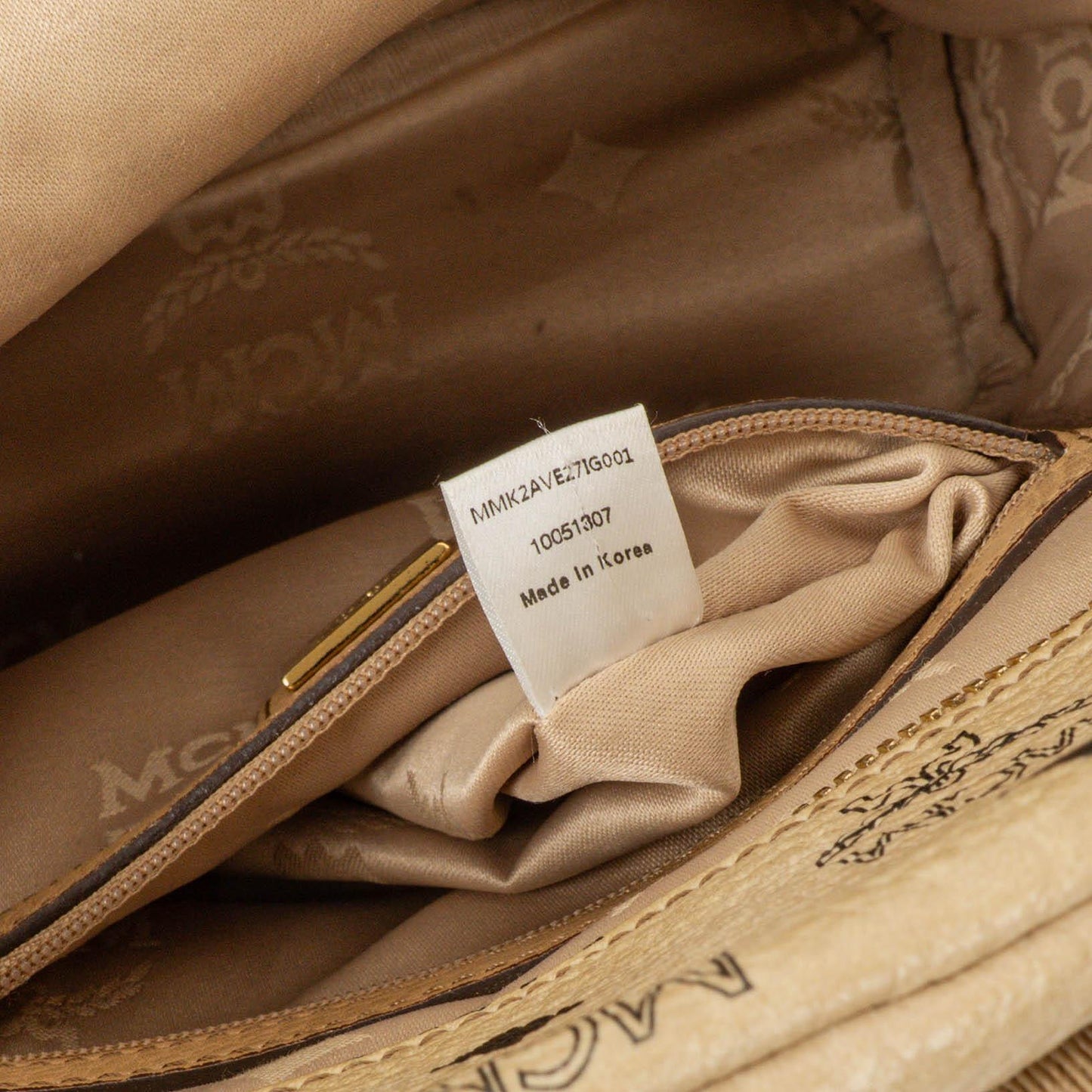 MCM Visetos Rucksack aus neutralem beschichtetem Canvas mit Nieten