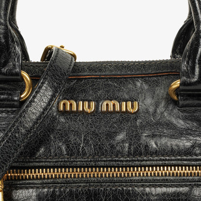 Miu Miu Vitello Lux Kleine Satchel Tasche aus schwarzem Leder