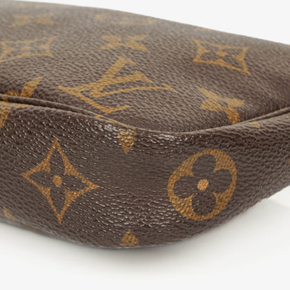 Louis Vuitton Pochette Accessoires Clutch aus Monogram Canvas
