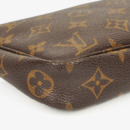 Louis Vuitton Pochette Accessoires Clutch aus Monogram Canvas