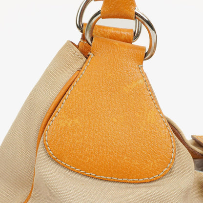 Prada Schultertasche aus beigem/karamellbraunem Canvas und Leder