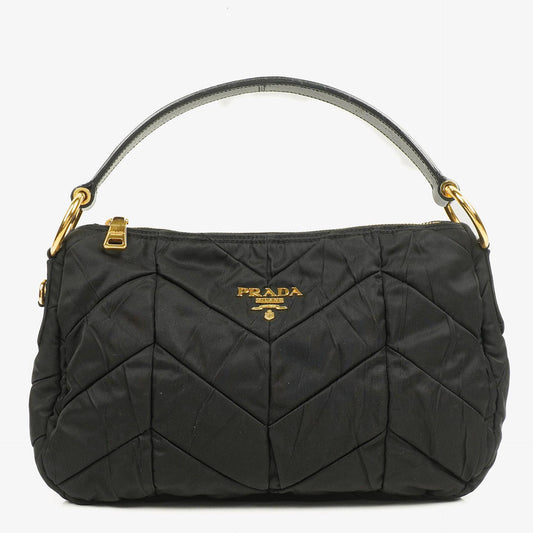 Prada schwarze Chevron-gesteppte Schultertasche aus Tessuto Nylon