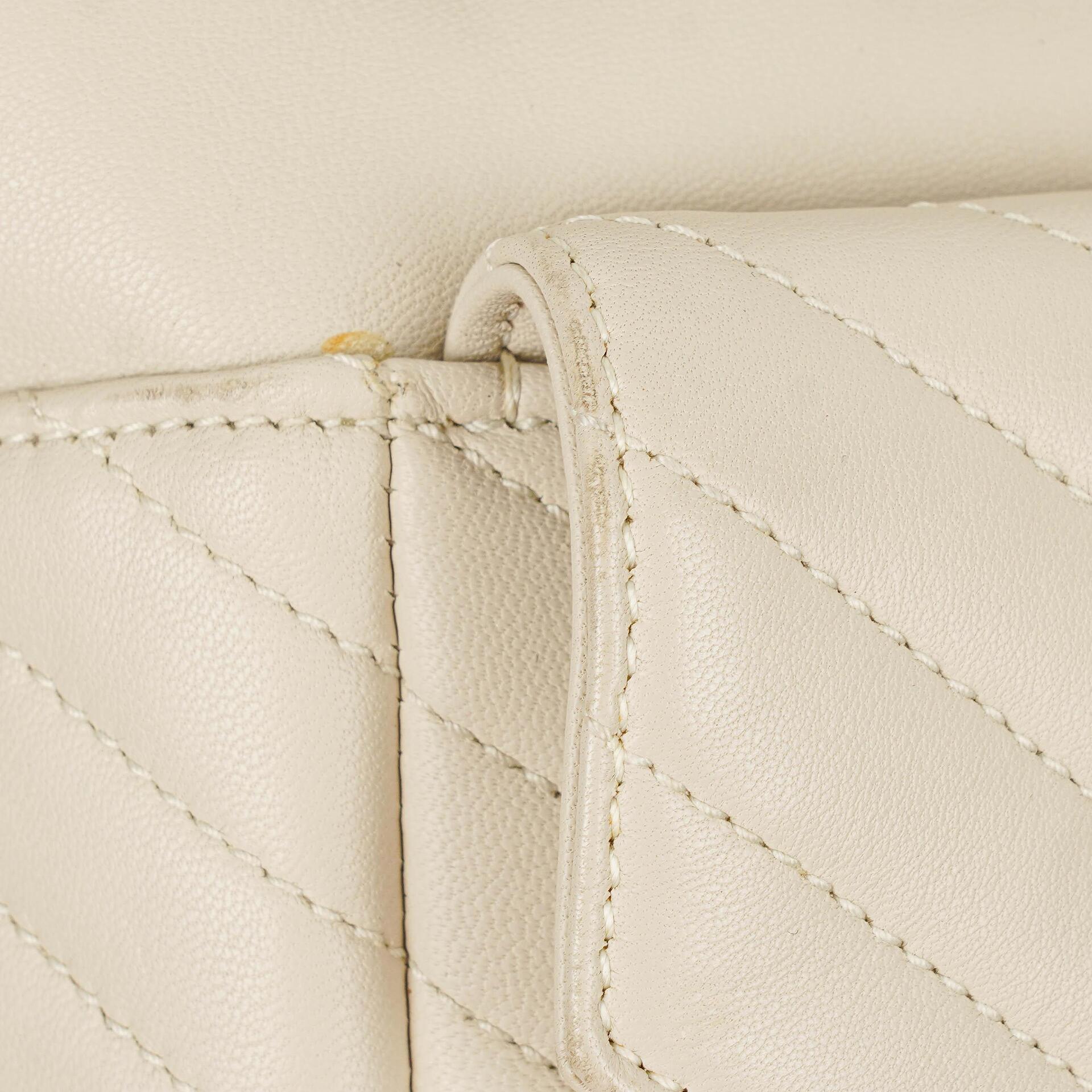 Saint Laurent Joe Rucksack aus weißem Chevron-gestepptem Lammleder