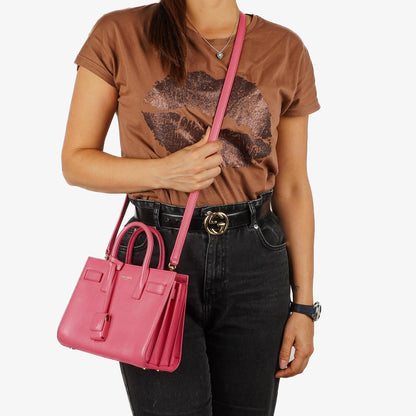 Saint Laurent Nano Sac De Jour Handtasche aus rosa Kalbsleder