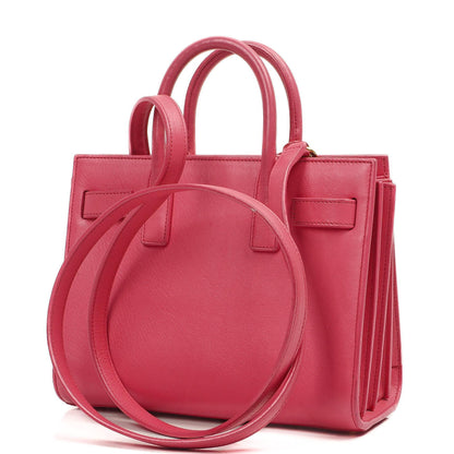 Saint Laurent Nano Sac De Jour Handtasche aus rosa Kalbsleder