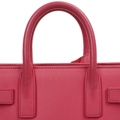 Saint Laurent Nano Sac De Jour Handtasche aus rosa Kalbsleder