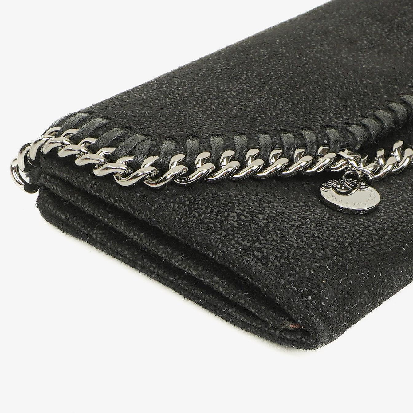 Stella McCartney Falabella Pochette Tasche aus schwarzem Shaggy Dear Kunstleder