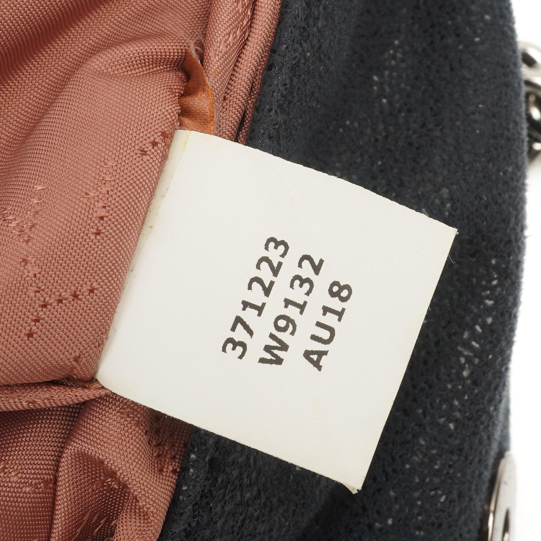 Stella McCartney Falabella Mini Tote Dunkelmarine Vegan Shaggy Deer Klappentasche