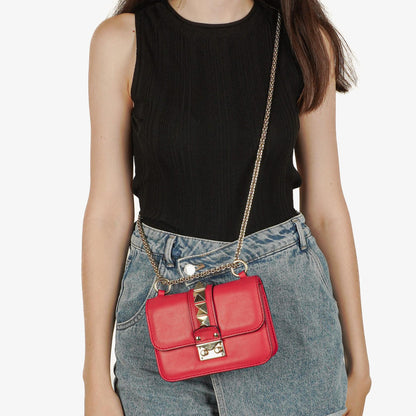 Valentino Garavani Glam Lock Rockstud Mini Klappentasche aus pinkem Vitello