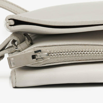Yves Saint Laurent Pouch Line Mini Crossbody Bag aus grauem Leder